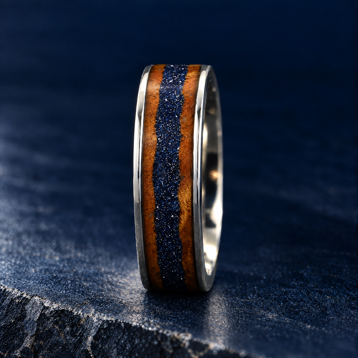 The Canyon silver titanium ring with sandstone wood inlay, upright side view