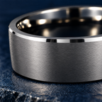 The Keystone silver and black tungsten ring, close-up of the brushed finish and bevelled edge