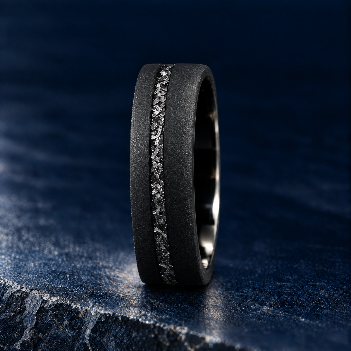 The Starfall black tungsten ring with meteorite inlay, upright side view
