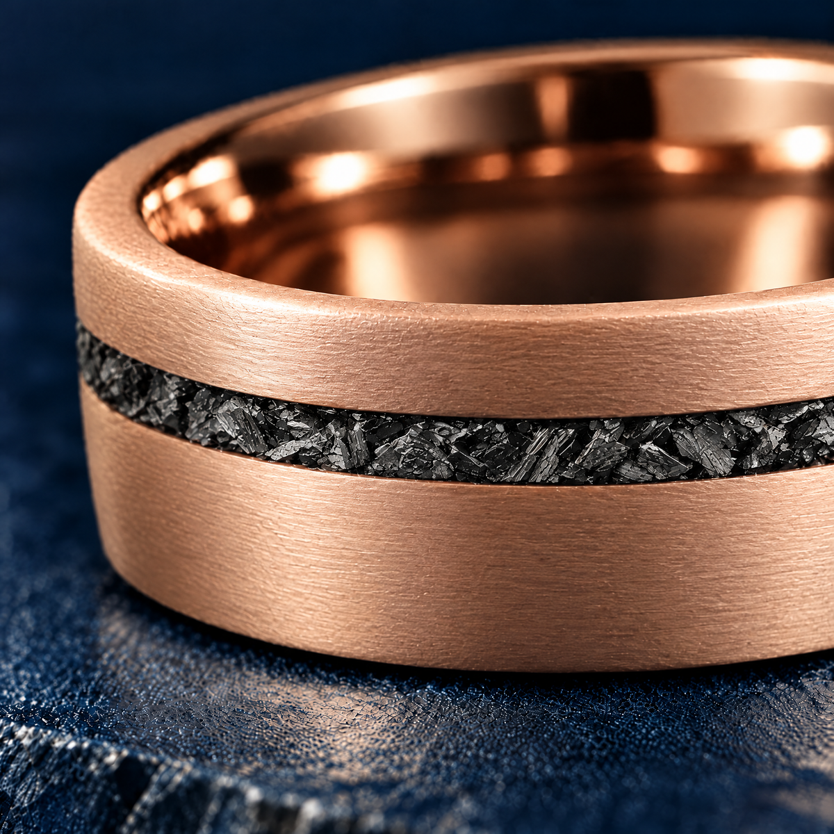 The Starfall rose gold tungsten ring, close-up of the meteorite inlay