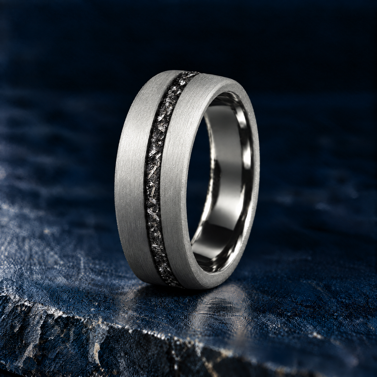 The Starfall silver tungsten ring with meteorite inlay, standing view