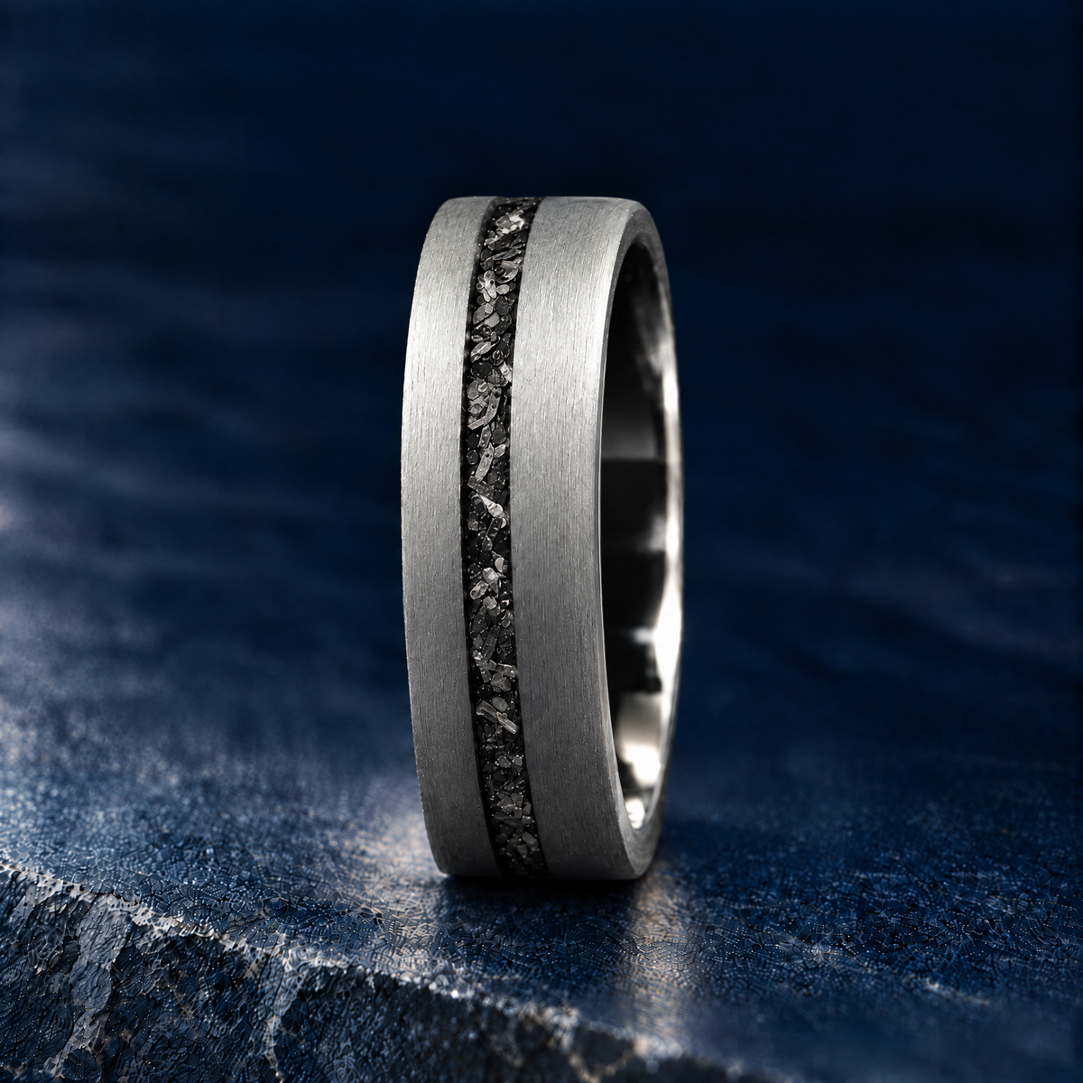 The Starfall silver tungsten ring with meteorite inlay, upright side view