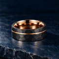 The Cinder black tungsten ring with rose gold accent, flat view, 8mm width