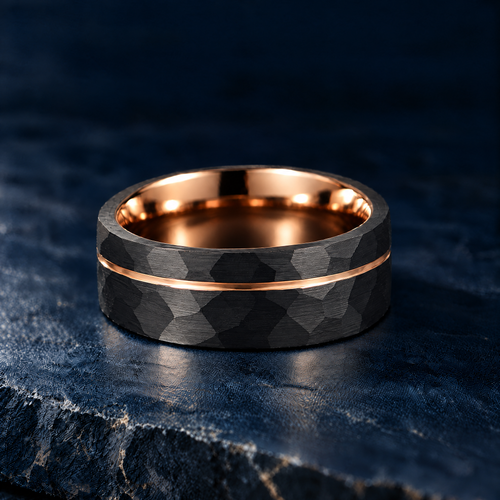 The Cinder black tungsten ring with rose gold accent, flat view, 8mm width