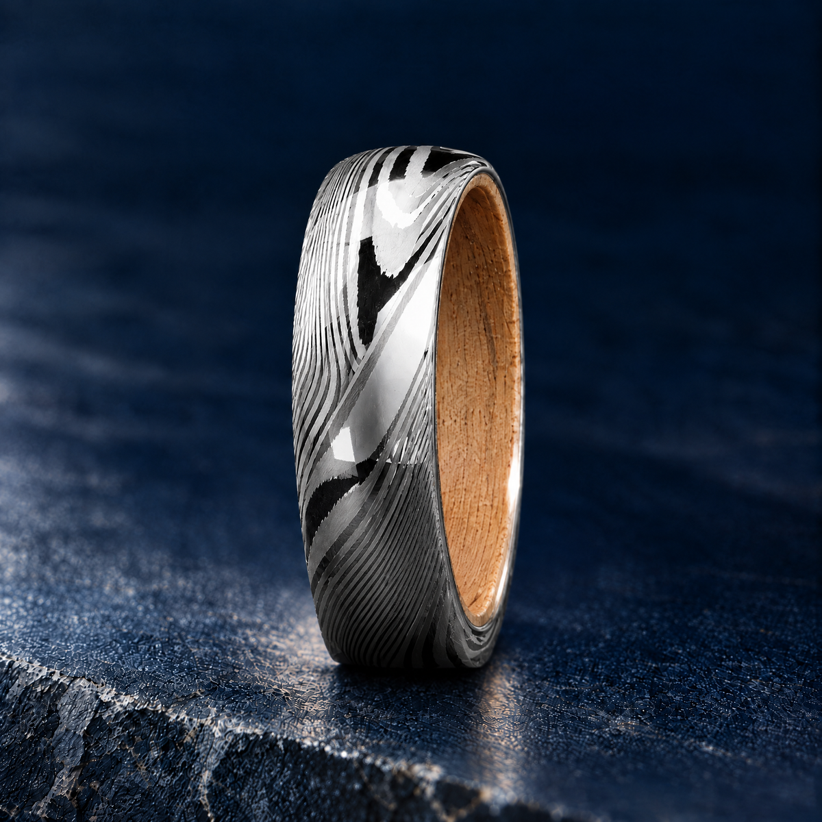 The Grove Damascus steel ring, side view