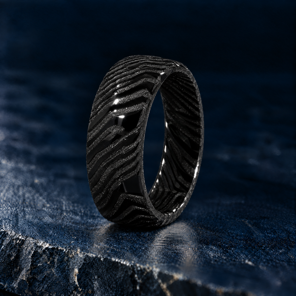 The Orion black Damascus steel ring, angled view