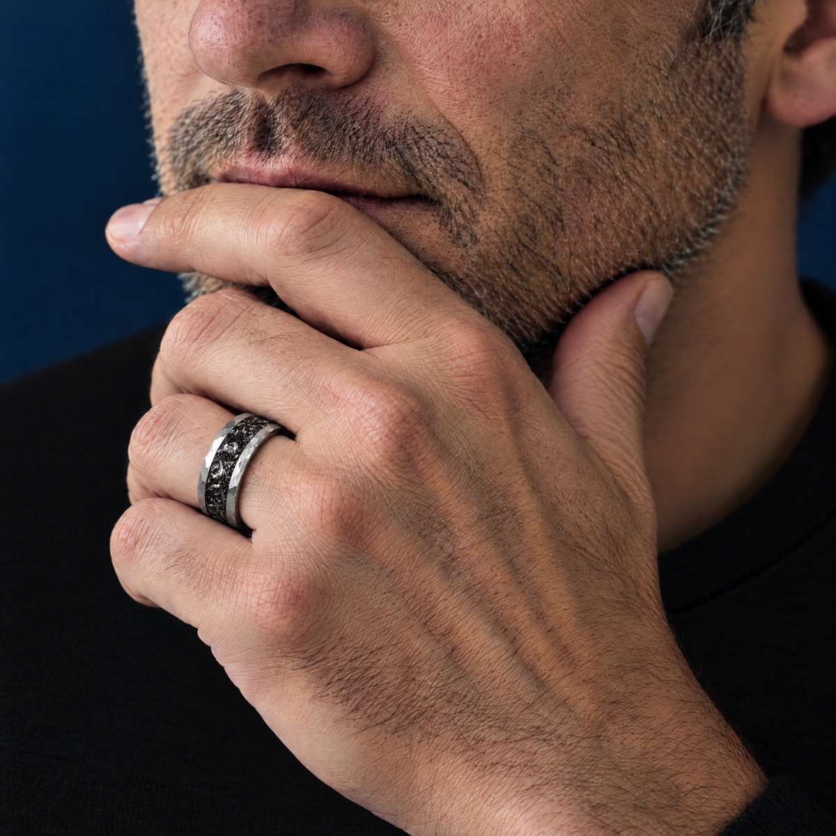 The Perseid tungsten ring worn by a man