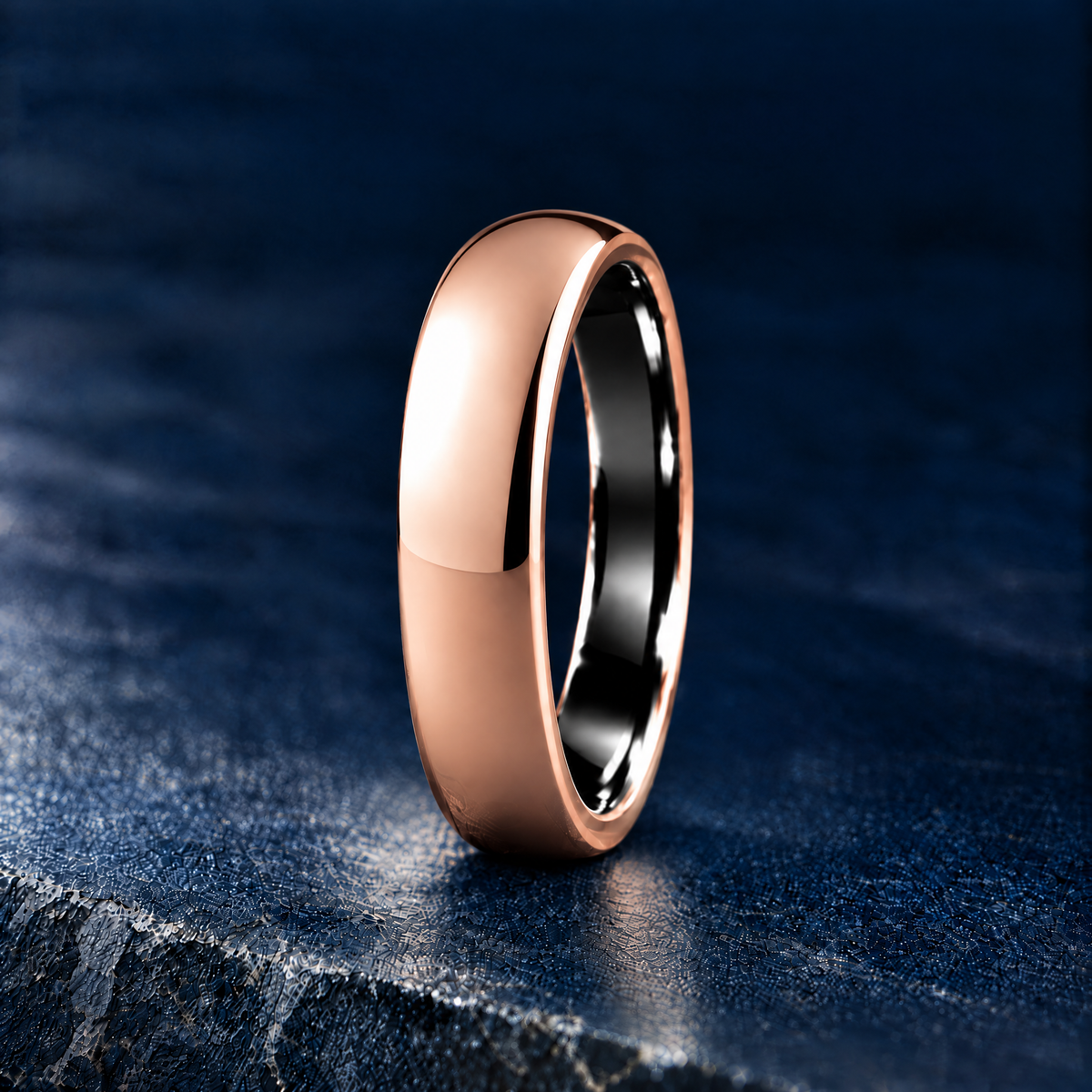 The Sovereign polished rose gold tungsten ring, side view